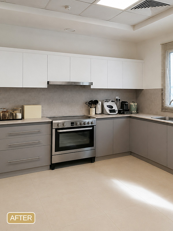 Kitchen after wrapping with modern white cabinet vinyl installed in a Dubai residential apartment.